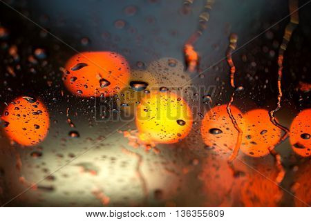 Selective Focus Of Raindrop On The Window Of The Car