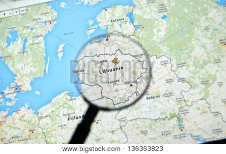 MONTREAL CANADA - JUNE 24 2016 - Lithuania on Google Maps app under magnifying glass. Lithuania is a european country and a member of EU.