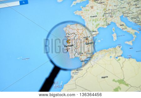 MONTREAL CANADA - JUNE 24 2016 - Portugal on Google Maps app under magnifying glass. Portugal is a european country and a member of EU.
