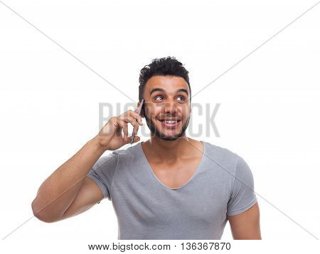 Casual Man Cell Smart Phone Call Look Up To Copy Space Happy Smile Young Handsome Guy Wear Shirt Jeans Isolated White Background