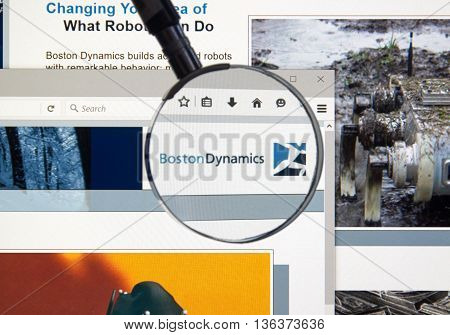 MONTREAL CANADA - JUNE 24 2016 : Boston Dynamics web page under magnifying glass. Boston Dynamics is the leading provider of human simulation software tools and solutions.