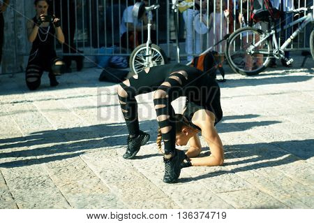 Montenegro, Herceg Novi - 04/06/2016: The girl from the town of Niksic acrobatic group shows its flexibility. 10 International Children's Carnival in Herceg Novi