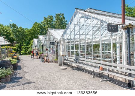 STOCKHOLM - JUNE 24, 2009: Rosendals garden in Stockholm. Rosendals garden has been chosen as one of the best places for having a coffee in Sweden.
