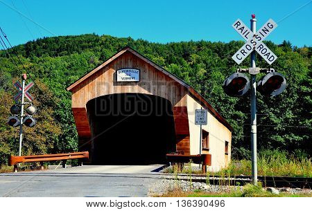 Bartonsville Vermont - September 19 2014: Bartonsville Covered Bridge a 151 foot long span over the Williams River is a replica of the original 1870 bridge destroyed during Hurricane Irene *
