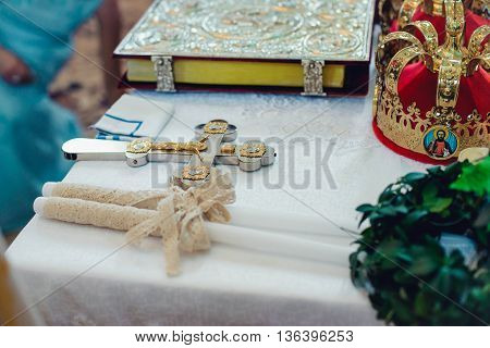 Wedding ceremonial attributes are on the altar in a church