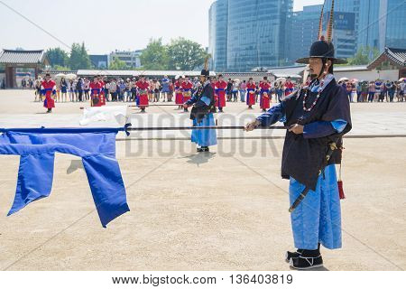 SEOULSouth Korea - MAY 22: Changing of the Royal guard ceremony at the Gwanghwamun main Gate of Gyeongbokgung Palace. MAY 22 2016 in Seoul South Korea
