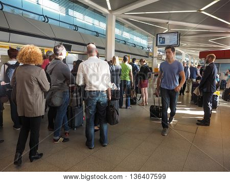 People Queue At Tegel Airport Check-in