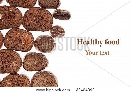 Decorative edging pieces of black rye bread on a white background. Isolated. Border. Pattern. Food background. View from above.