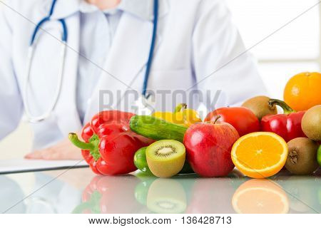 Doctor Nutritionist With Fruits And Vegetable