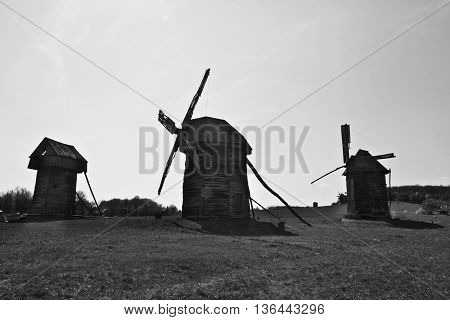 Landscape with old windmills in the village Pirogovo, Ukraine Eastern Europe. Black and white image.