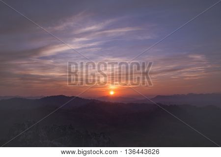 Colorful sunset on top of thailand mountain