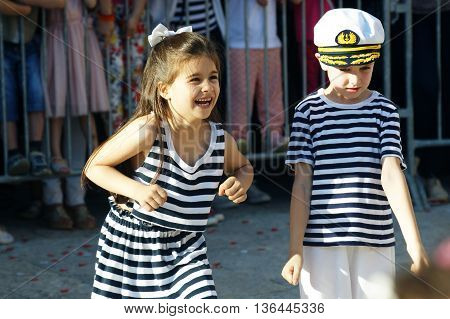 Montenegro, Herceg Novi - 04/06/2016: Girl and boy in carnival costume sailors. 10 International Children's Carnival in Herceg Novi