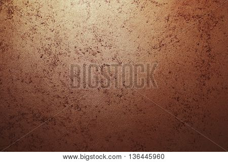 Grunge background from sheet metal of bronze