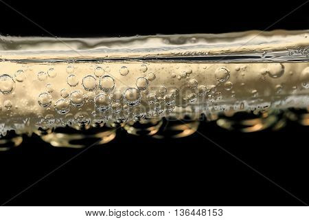Slice of lemon in a drink close up