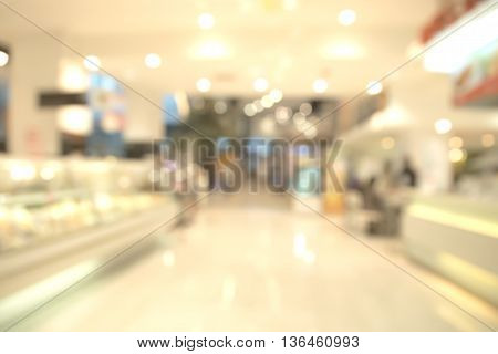 Abstract blurry warm ambient frozen food refigerator background