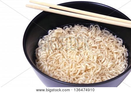 Bowl of instant noodles isolated on white background.