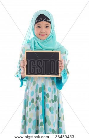 Portrait of asian muslim girl holding blackboard on white background isolated
