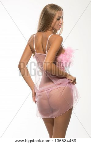 sexy blond woman in color lingerie. Studio shot on white background.