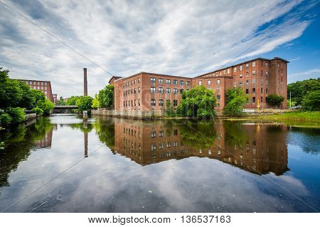 Historic Brick Buildings And The Cocheco River, In Dover, New Hampshire.