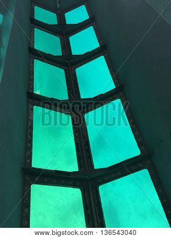 A glass bottom boat. Passengers can sit and look down to see what's on the ocean flloor without getting wet.