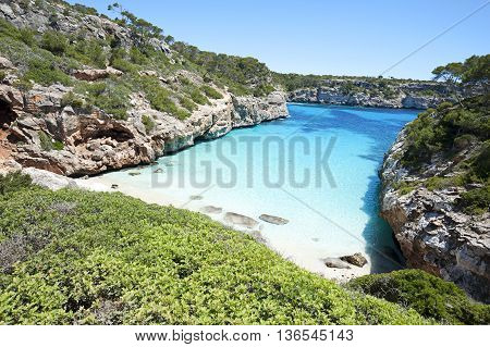 Beautiful Turquoise Clear Water At Majorca Beach, Calo Des Moro, Spain