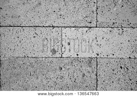 Abstract black and white brick building wall background texture