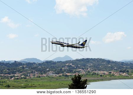KERKYRA GREEES - MAY 14: The aircraft of Ryanair Airlines taking off in Corfu International Airport on May 14 2016 in Kerkyra Greece. Up to 16 mln tourists is expected to visit Greece in year 2016.