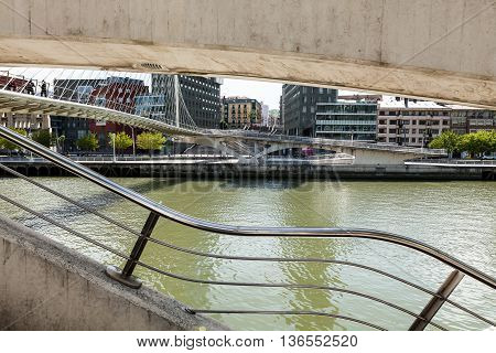 Bilbao, Vizcaya/Spain - 06/16/2016: Perspective Calatrava or Zubizuri Bridge on the River Nervion in Bilbao