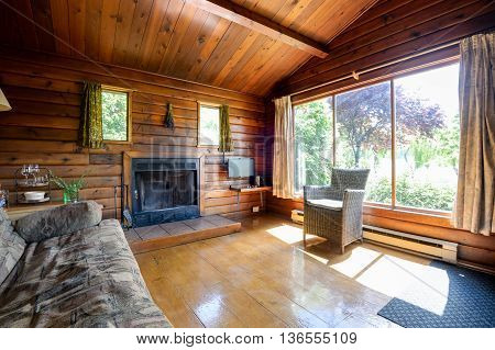 Cozy interior of a rustic log cabin.