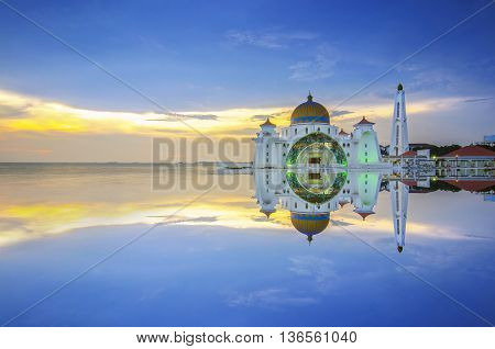 Majestic view of Malacca Straits Mosque during sunset.