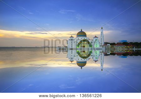 Majestic view of Malacca Straits Mosque during sunset.