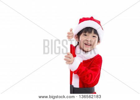 Little asian boy in Santa Claus uniform with an empty banner isolated on white