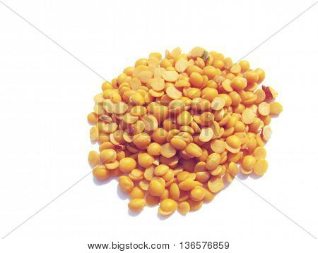 Image of tropical split green pea (Cajanus cajan) also called toor daal along with the raw pea