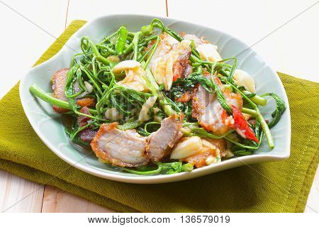 close up fried Water Minosa with crispy pork