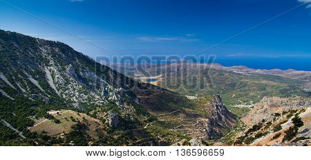Mountains of the island of Crete and winding road. The view from the pass