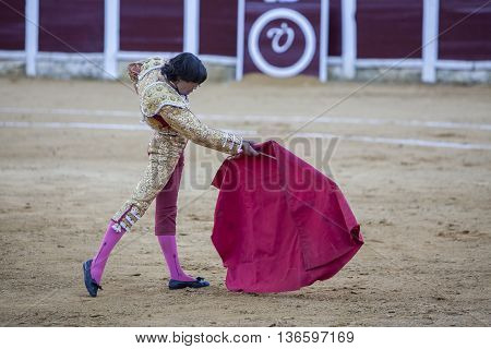 Ubeda Spain - September 29 2010: The Spanish Bullfighter Curro Diaz bullfighting with the crutch in the Bullring of Ubeda Spain