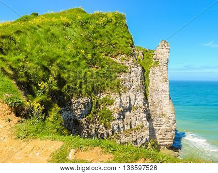 White chalk cliffs of Etretat. Cote d'Albatre or Alabaster Coast is part of the French coast of the English Channel, France