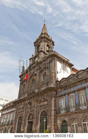 PORTO PORTUGAL - MAY 26 2016: Trinity Church (Igreja da Trindade circa 19th c.) in the historical center of Porto Portugal (UNESCO site). Architects Carlos Amarante and Jose Francisco