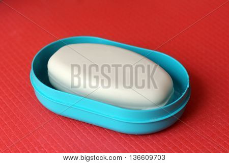Aroma soap in a blue soap dish