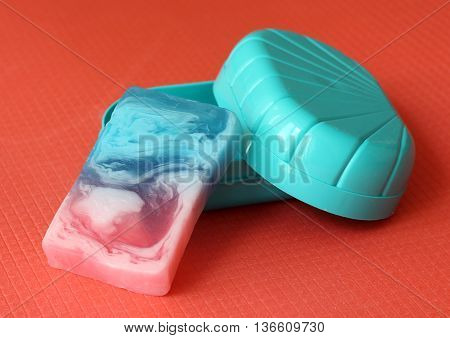 Aroma soap in a blue soap dish