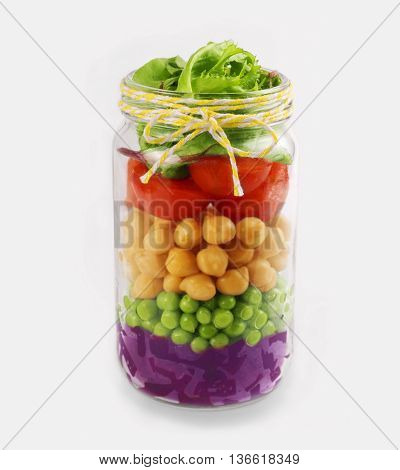 Salad in a jar. Healthy Homemade Mason Jar Salad. The concept of healthy proper nutrition for the whole family.