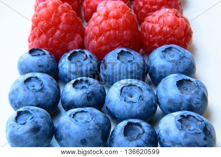 Closeup Of A Bunch Of Raspberries And Blueberries