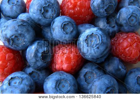 Closeup Of A Bunch Of Raspberries And Blueberries