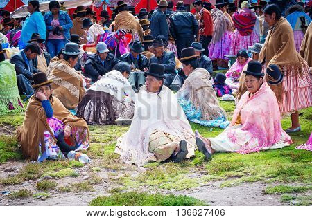 Copacabana Bolivia-March 23 2015:Bolivian women in traditional clothes on the street Copacabana.