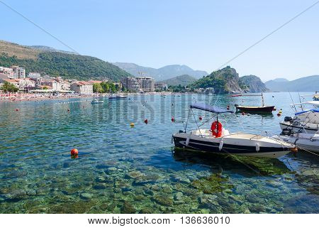 PETROVAC MONTENEGRO - SEPTEMBER 19 2015: Pleasure boats on waterfront of popular resort town of Petrovac Montenegro