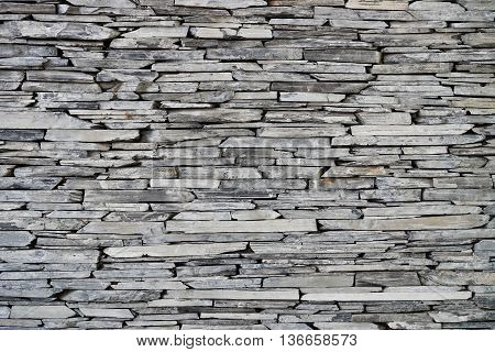 Stone wall background for design and decoration
