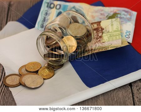 Money on the Russian flag. Russian money.