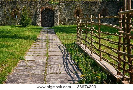 Vintage wooden door and fence. Ukraine Dubno Carpathian