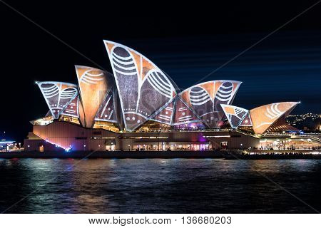 Sydney Australia - 2016 May 27: Annual outdoor lighting festival Vivid Sydney: Festival of Light Music and Ideas. Sydney Opera House illumination Lighting the Sails Songlines. Long Exposure
