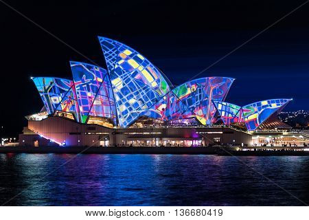 Sydney Australia - 2016 May 27: Annual outdoor lighting festival Vivid Sydney: Festival of Light Music and Ideas. Sydney Opera House illumination Lighting the Sails Songlines. Long Exposure
